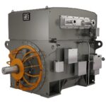 A large grey machine with yellow wheels Description automatically generated